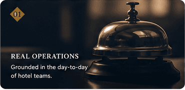 A hotel bell at a front desk, representing the real operations behind each booking
